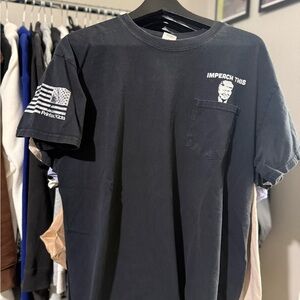 Trump “Rip N DIp” Impeach This black pocket tee Men’s Size L